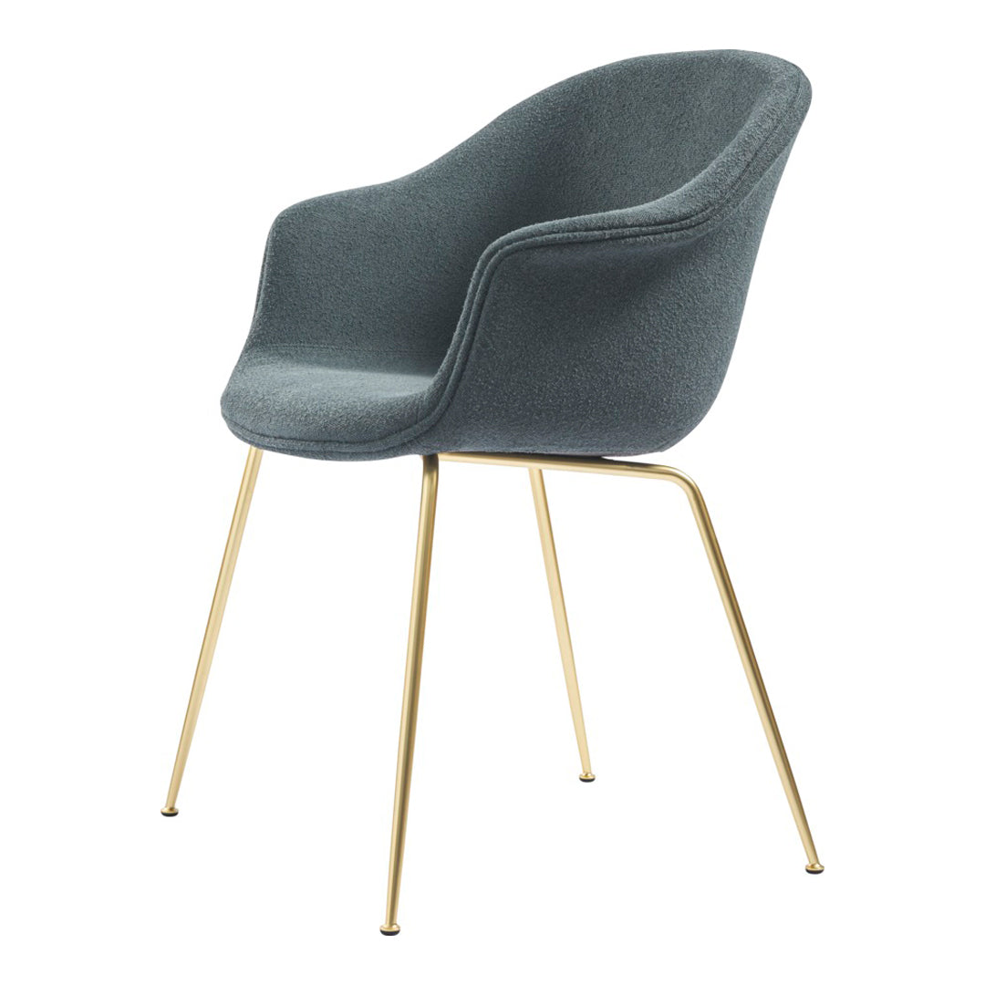 Gray upholstered chair with a smooth texture and sleek gold metal legs, perfect for modern decor.