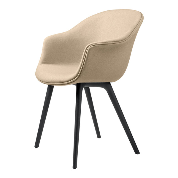 Beige upholstered chair with a sleek design and black wooden legs, perfect for modern interiors.