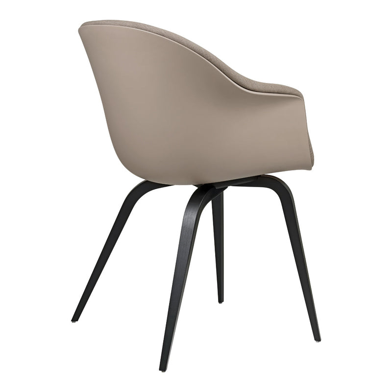 Beige upholstered chair with sleek black metal legs, featuring a smooth and modern design. Perfect for any decor.
