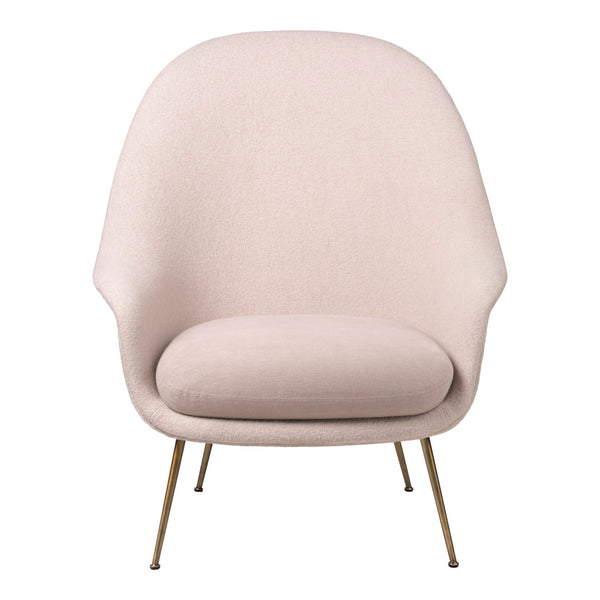 Soft pink armchair with smooth fabric and sleek gold legs, perfect for modern minimalist decor.