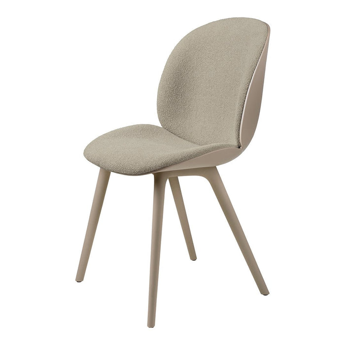 Light beige upholstered chair with smooth, modern contours and natural wood legs, perfect for contemporary interiors.