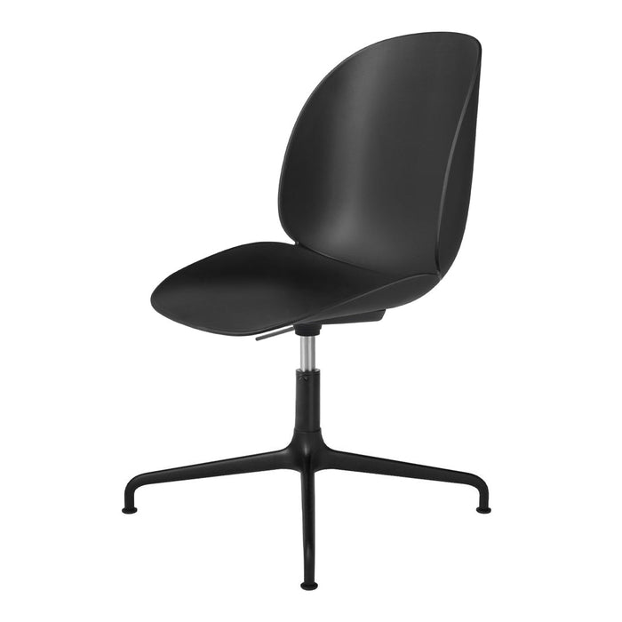 Black modern chair with a sleek, minimalist design and smooth, curved seat. Perfect for contemporary spaces.