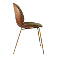 Modern chair featuring a smooth olive green seat and a rich walnut wood back, complemented by sleek gold legs.
