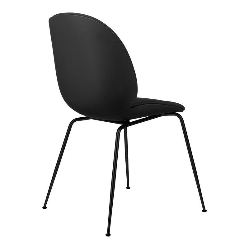 Modern black chair with a sleek, curved design and minimalist black metal legs. Ideal for contemporary decor.