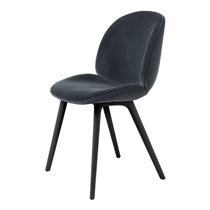 Sleek gray velvet chair with a modern black frame, featuring a smooth, minimalist design. Perfect for contemporary spaces.