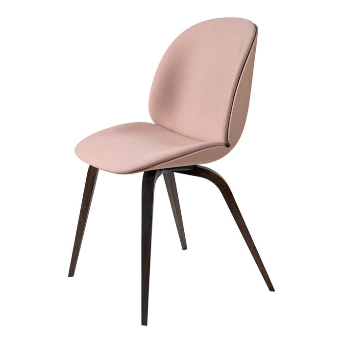 Pink upholstered chair with smooth curves and dark wooden legs, ideal for modern or minimalist decor.