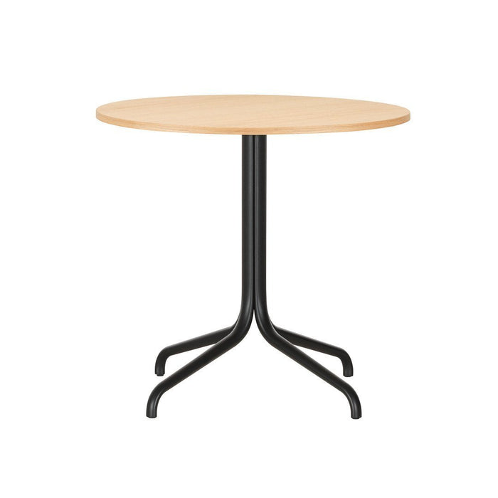 Round wooden table with a light natural finish and a sleek black metal base, featuring a minimalist design.