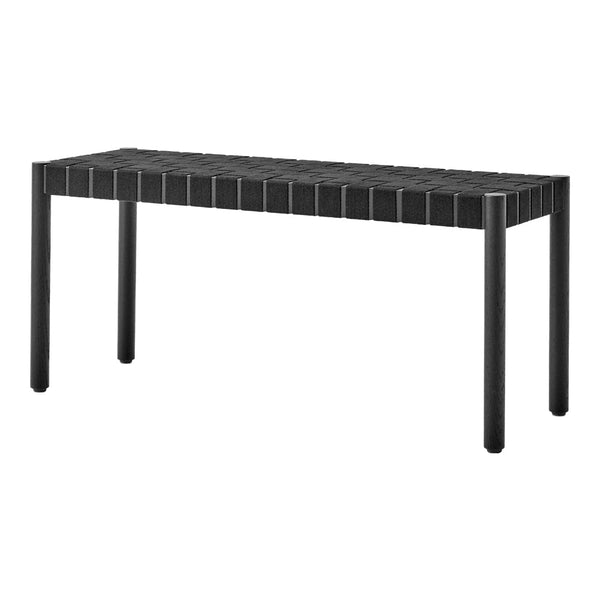Black rectangular table with a slatted top design, featuring sleek lines and minimalistic style.