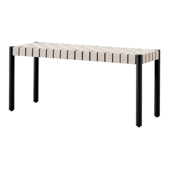 Stylish bench with a striped light beige top and sleek black legs, perfect for modern decor.