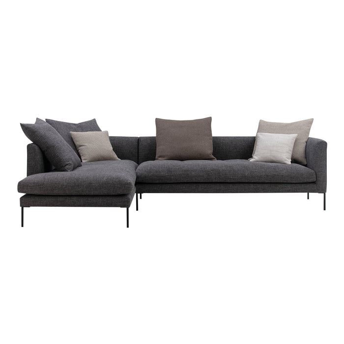 Gray sectional sofa with a textured fabric and assorted beige and gray cushions, featuring sleek black legs.