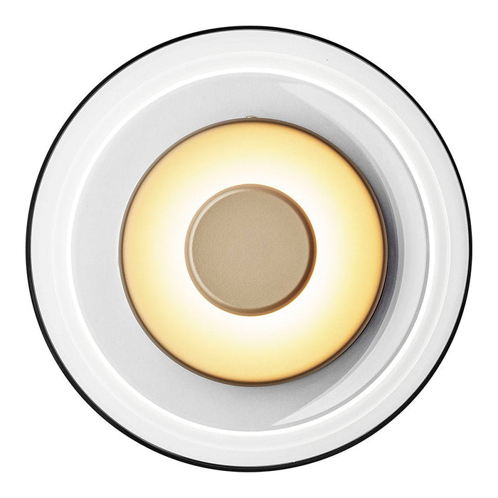 Round ceiling light with a glossy white finish, gold center, and soft, warm white glow. Modern and minimalist design.