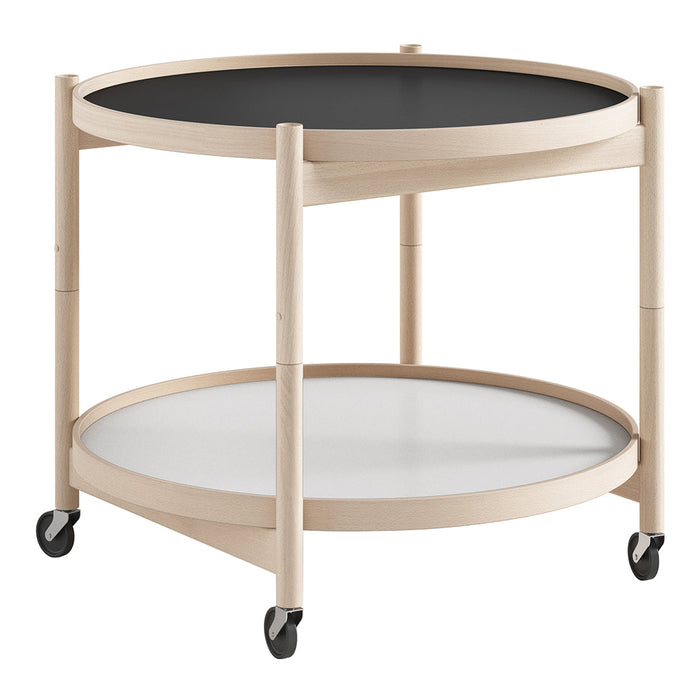 Round two-tiered coffee table in black and white finishes, featuring a natural wood frame and rolling wheels.