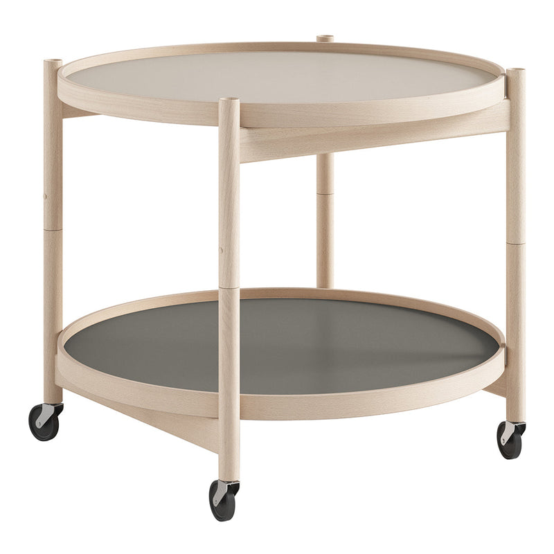 "Round two-tiered cart in light wood and soft gray, featuring minimalist design and smooth, clean lines."