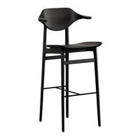 Black bar stool with a sleek, modern design, featuring smooth lines and a textured seat pattern.