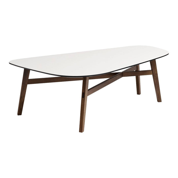 White oval tabletop with a smooth finish, complemented by dark wood legs and a modern, minimalist design.