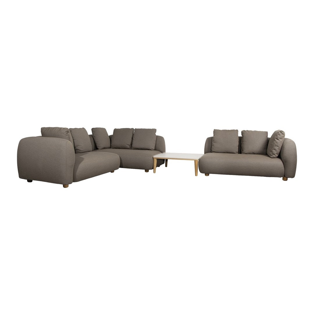 Stylish gray sectional sofa with plush cushions and smooth fabric, perfect for modern living rooms.