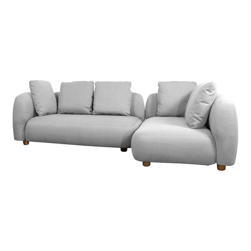 Light gray plush sofa set with smooth fabric and rounded cushions for a cozy, modern look.