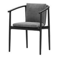 Stylish black chair with a textured gray fabric seat and back, featuring sleek armrests for modern decor.