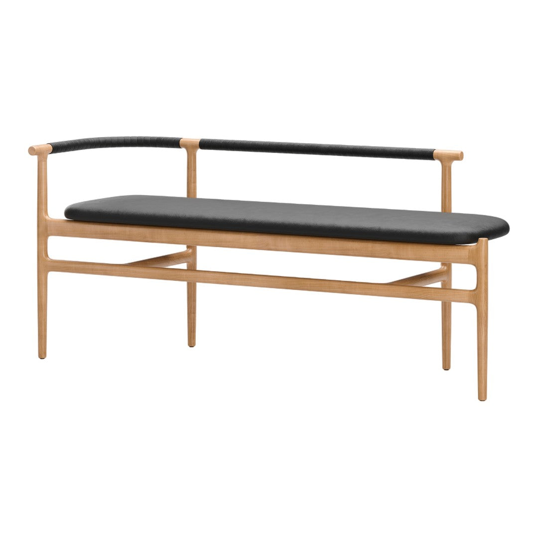 Modern wooden bench with a natural finish and a sleek black leather cushion. Stylish and minimalist design.