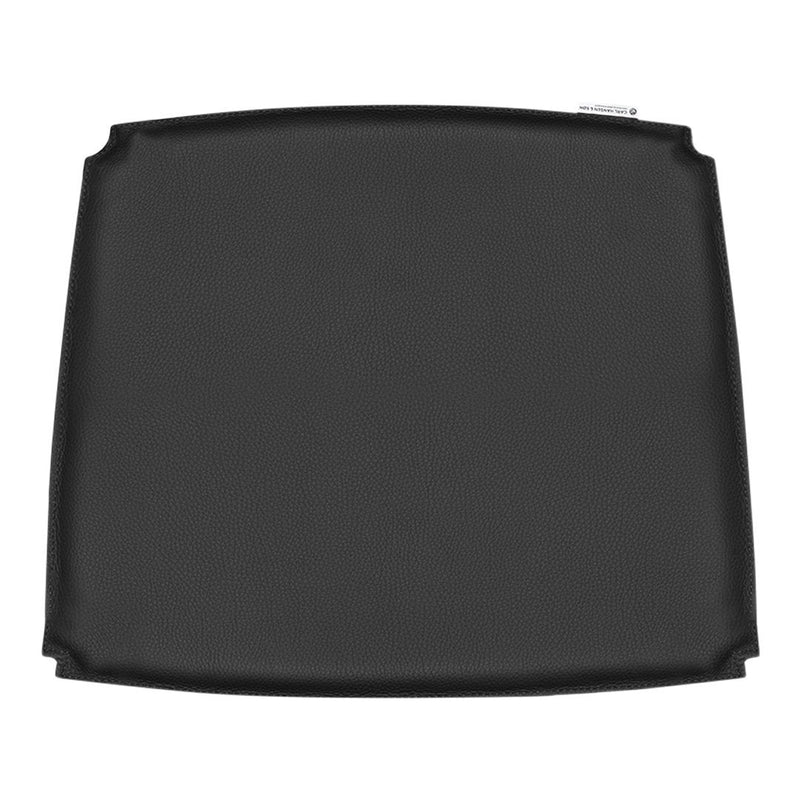 Black square griddle with a smooth, non-stick surface, perfect for even cooking and easy cleaning.
