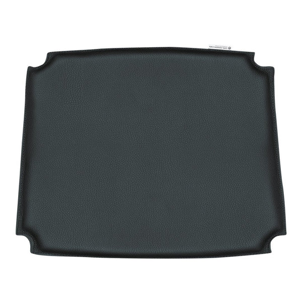 Black rectangular tray with smooth, solid surface and curved edges, perfect for dining and serving needs.