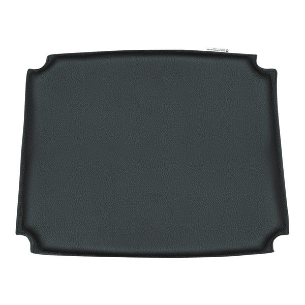 Black rectangular serving tray with a smooth matte finish and curved edges, ideal for elegant dining presentations.