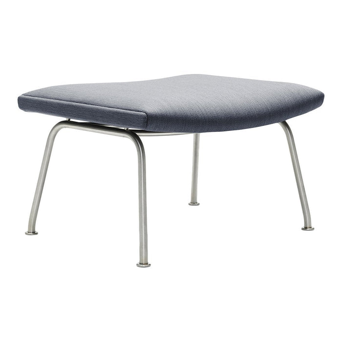 Stylish gray ottoman with a smooth upholstered surface and sleek metallic legs. Perfect for modern decor.