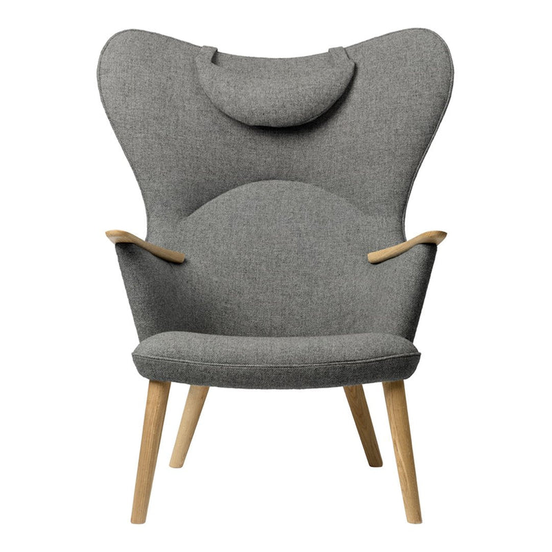 Stylish gray upholstered chair with a unique butterfly shape and natural wood legs. Perfect for modern decor.