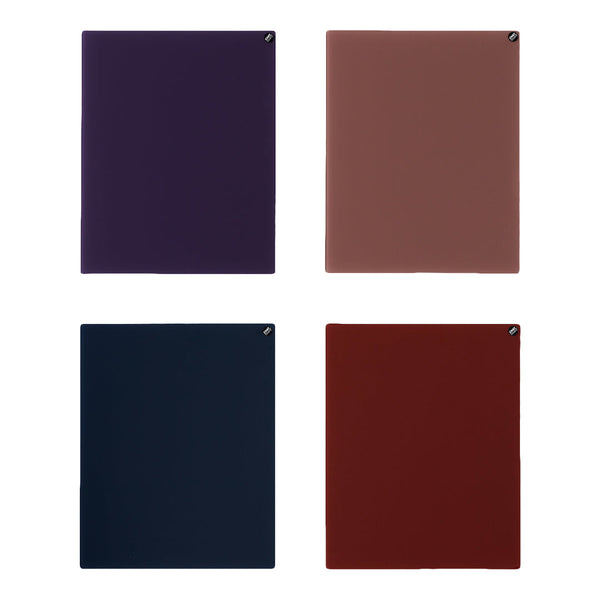 "Set of four A5 notebooks in deep purple, warm taupe, navy blue, and rich burgundy colors, showcasing smooth finishes."