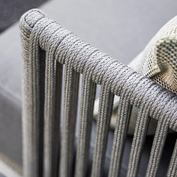Gray rope detailing showcases a modern, textured pattern on a stylish furniture piece.