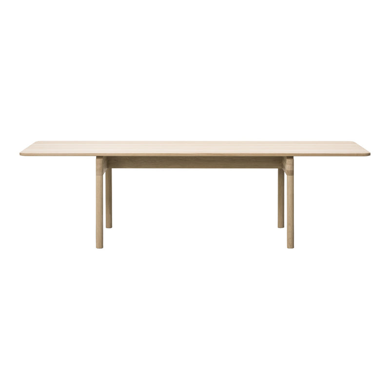 Light natural wood dining table with a sleek, minimalist design and smooth finish. Perfect for any modern decor.