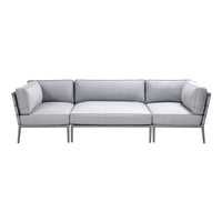 Modern gray sectional sofa with sleek metal frames, featuring a minimalist design and clean lines. Perfect for contemporary spaces.