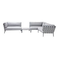Stylish gray outdoor sectional sofa with sleek metal accents and a modern geometric pattern.