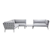 Gray outdoor sectional sofa with sleek lines, minimalist design, and matching coffee table. Perfect for modern patios.