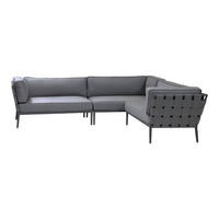 Gray outdoor sectional sofa with sleek cushions and a modern lattice pattern on the sides. Perfect for patio styling.