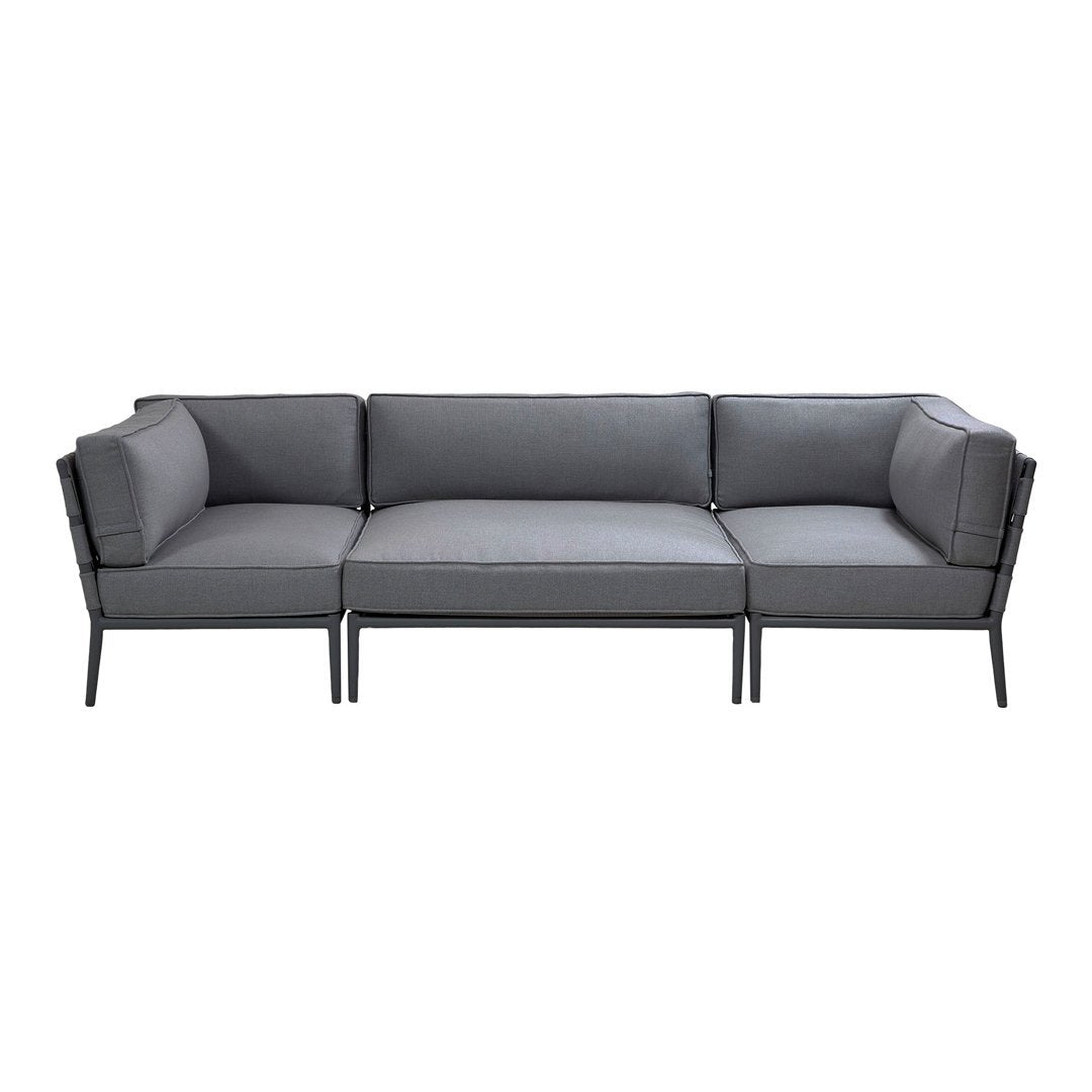 Modern gray sectional sofa with a sleek design and subtle texture, complemented by black metal frame accents.