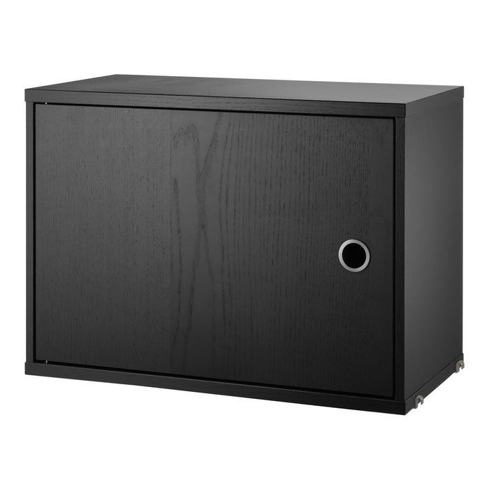 Black wooden storage cabinet with a smooth finish and subtle grain pattern, featuring a round silver handle.