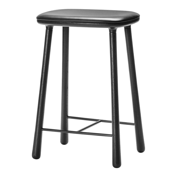 Black bar stool with a sleek, minimalistic design and smooth, matte finish. Ideal for modern decor.