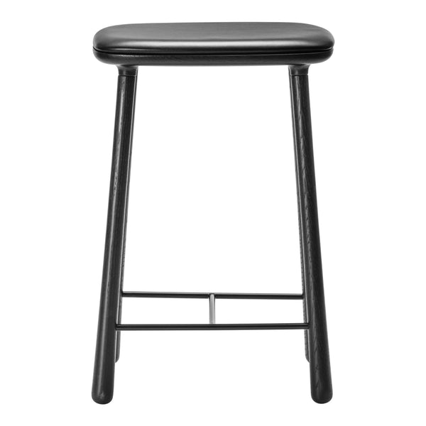 Black bar stool with a sleek, minimalist design and smooth surface, featuring four sturdy legs and a subtle sheen.