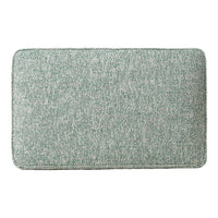 Soft teal bath mat with subtle texture and a minimalist design, perfect for adding a calming touch to any bathroom.