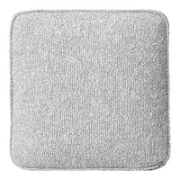 Textured light gray cushion with a subtle pattern, featuring a square shape and contrasting stitched edging.