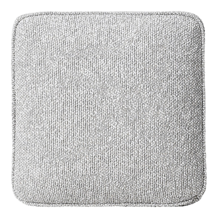 Textured light gray cushion with a subtle pattern, featuring a square shape and contrasting stitched edging.