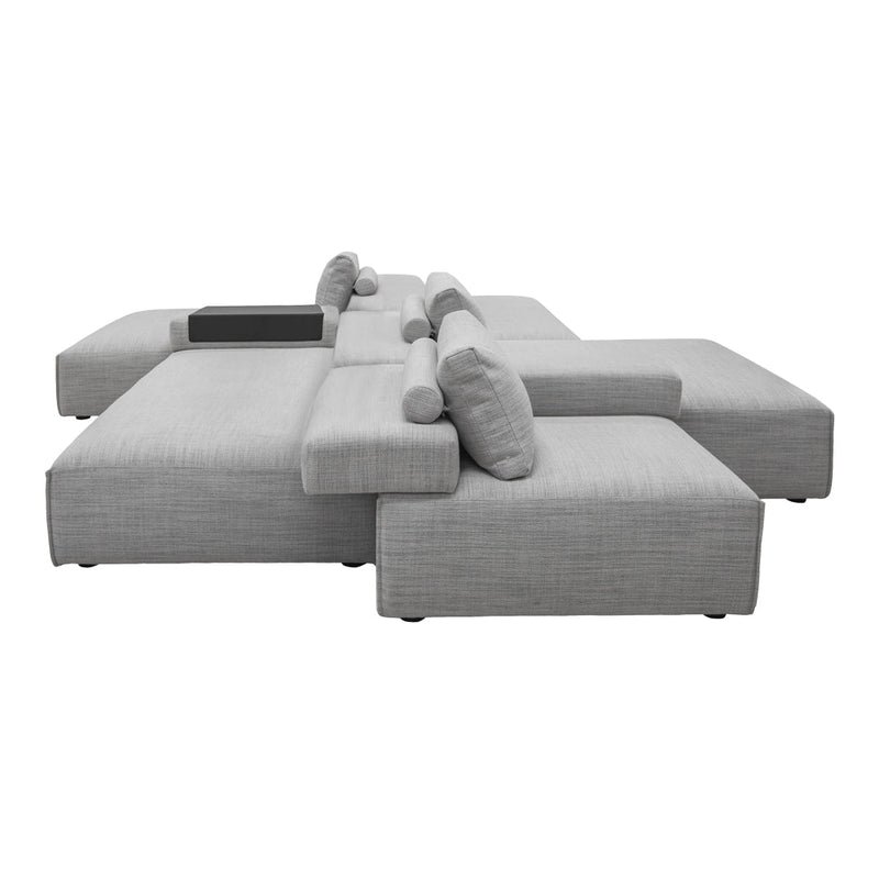 Light gray modular sofa with a textured fabric and subtle linear pattern, featuring soft, rounded cushions.