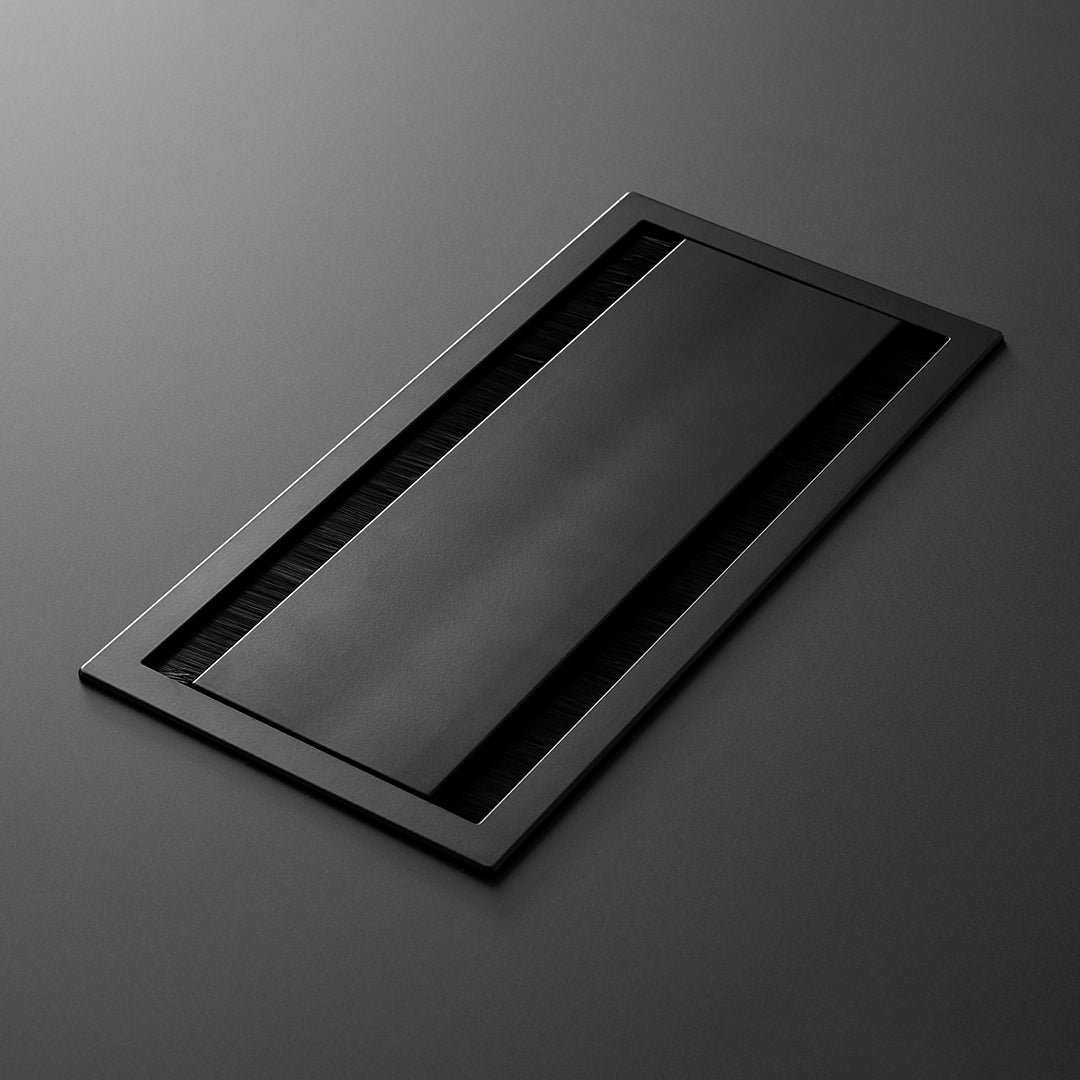 Sleek black rectangular surface with smooth texture and minimalistic design, perfect for modern decor.
