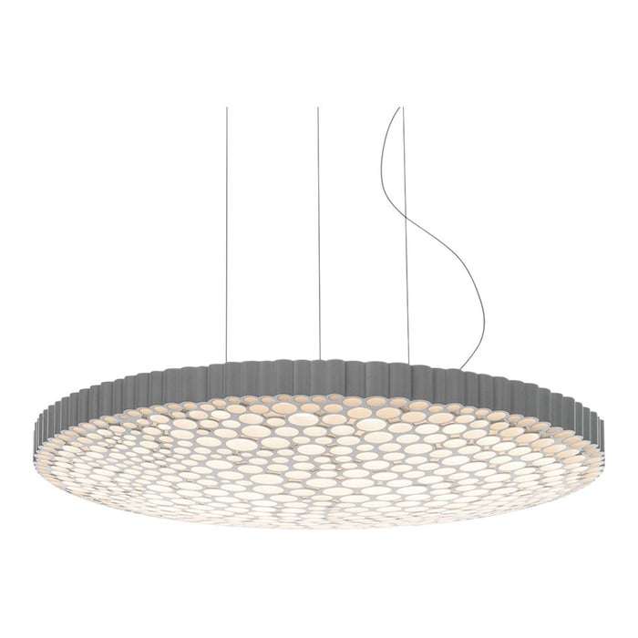 Sleek circular pendant light with a honeycomb pattern, featuring soft white and gray colors for modern décor.