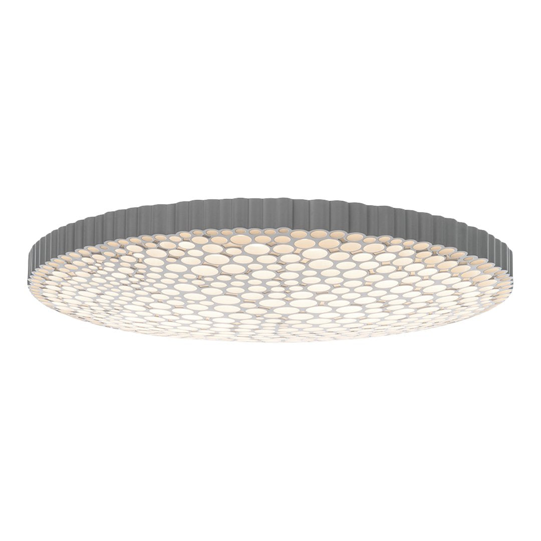 Round ceiling light featuring a sleek gray rim and a honeycomb-patterned white diffuser. Modern and minimalist design.