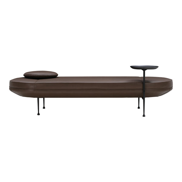 Brown upholstered bench with smooth, rounded edges and a minimalist black side table. Modern design, neutral tones.