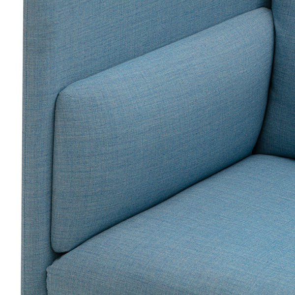 Light blue upholstery with a subtle textured pattern, perfect for contemporary furniture designs.