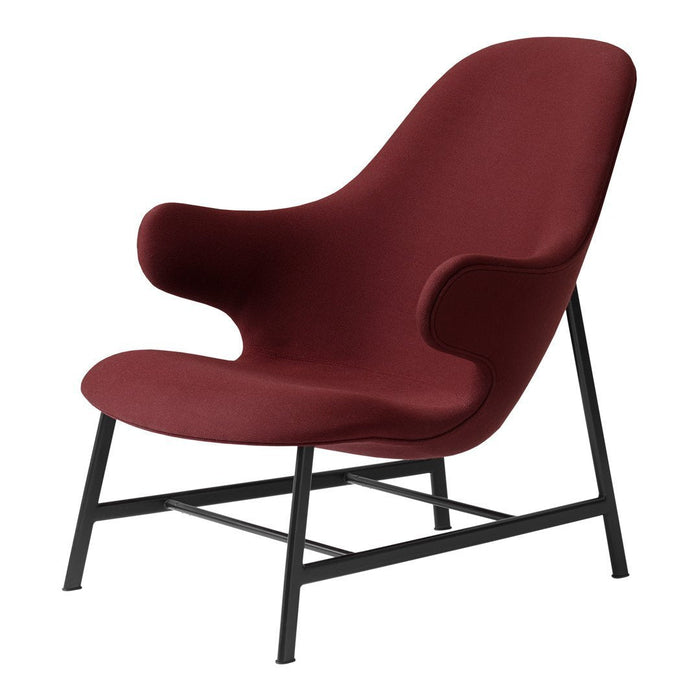 Burgundy upholstered chair with a minimalist black metal frame, featuring a sleek, modern design.