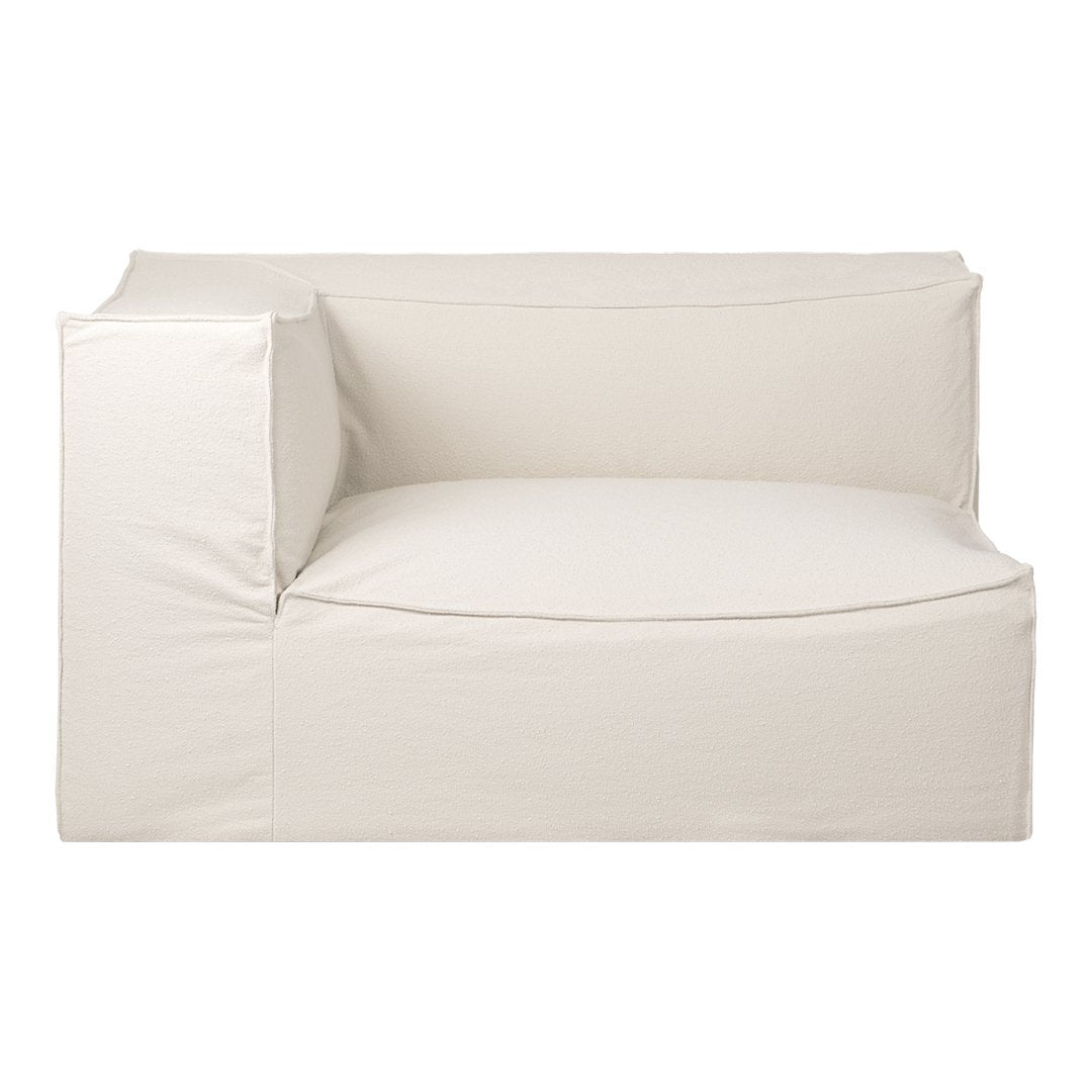 Cream-colored sofa with a minimal design and soft fabric texture. Ideal for modern decor settings.